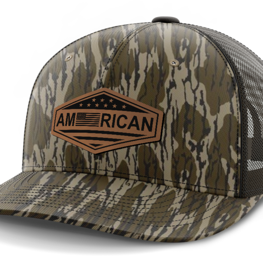 American Flag, Leather Patch Trucker Hat — Mossy Oak Bottomland